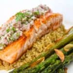 Pan-seared salmon with asparagus, arugula, zucchini and quinoa