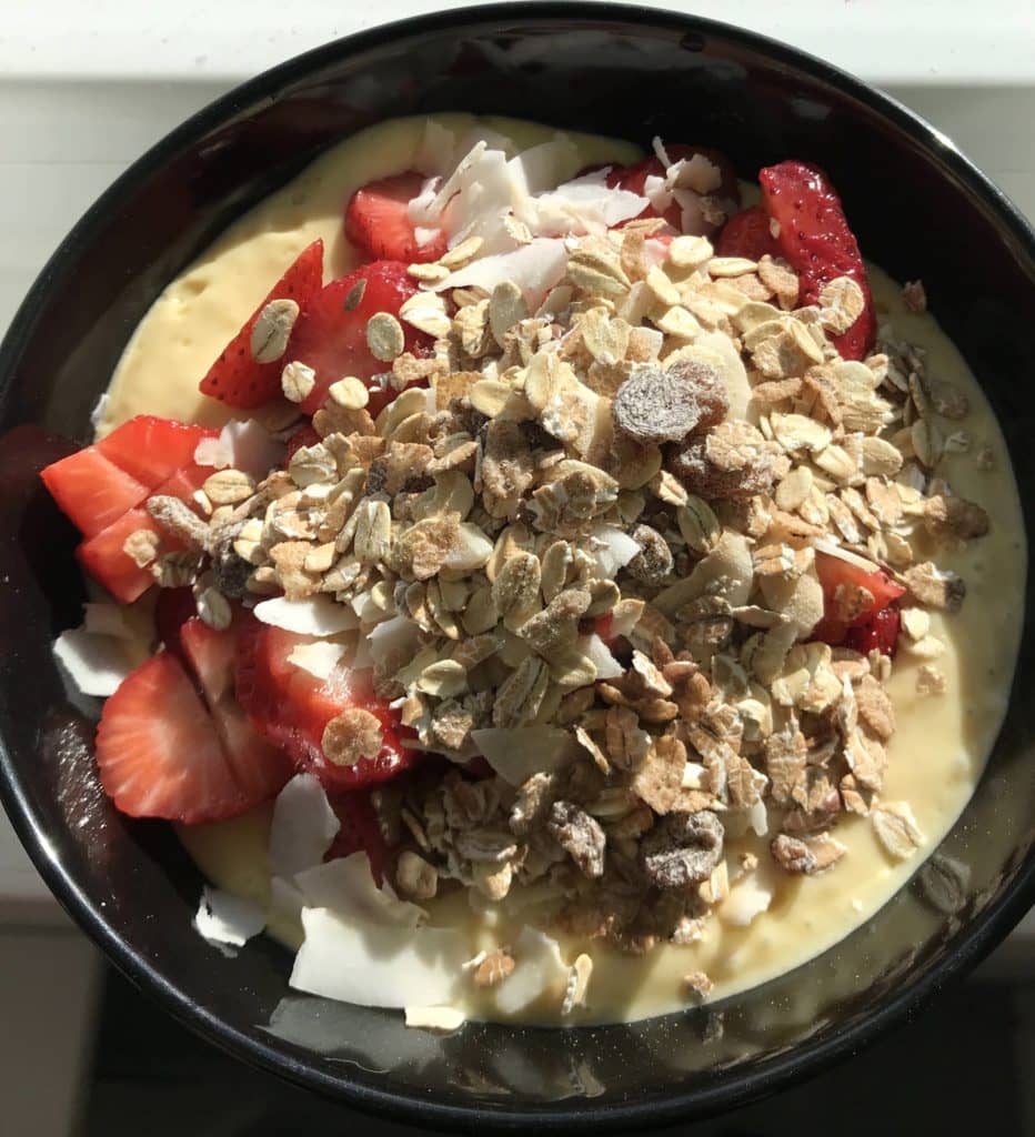 manga and yogurt with strawberry and muesli bowl food